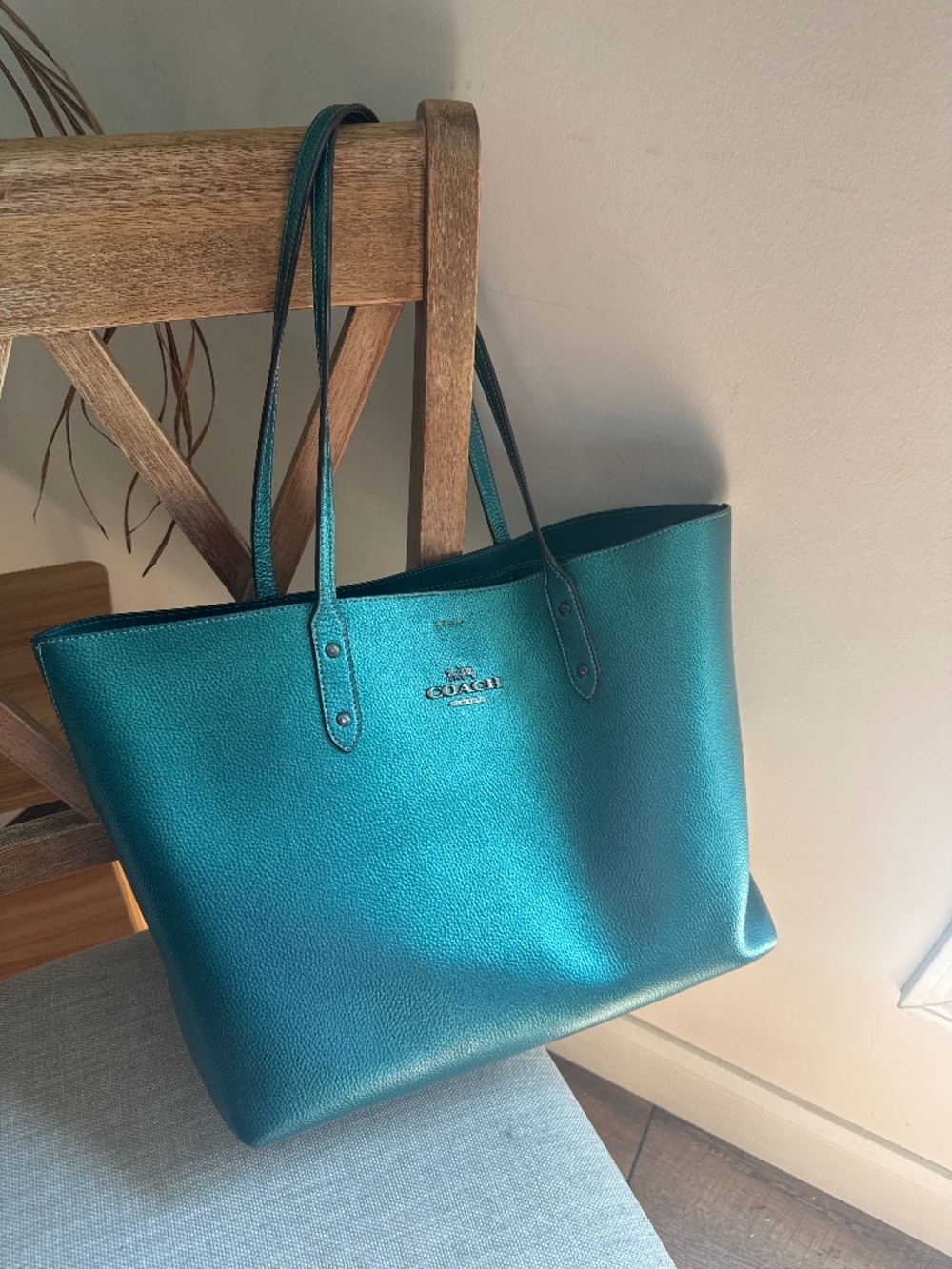 Metallic green coach tote